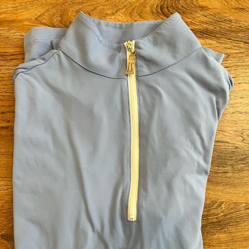 Tailored Sportsman Icefil sunshirt. Size XS. Color is blue cornflower.